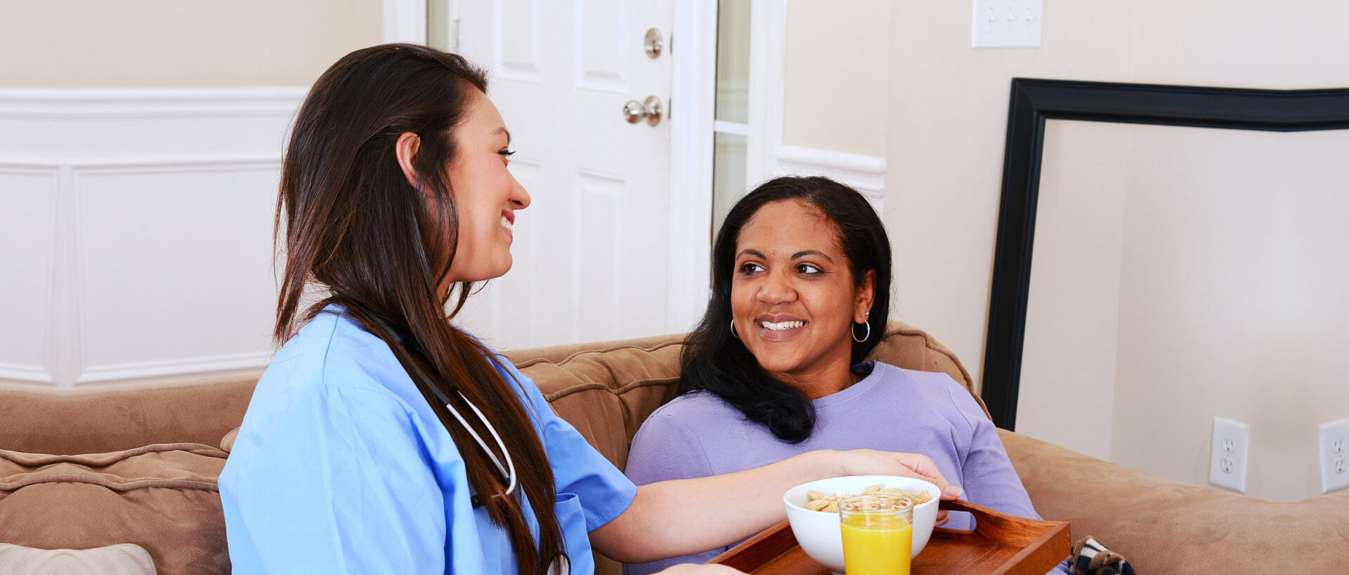caregiver showing care to a woman